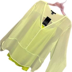 Neon green tunic with tank top.